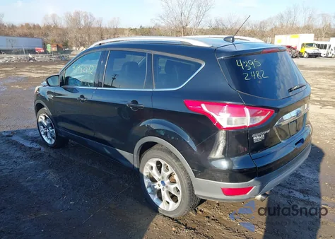 2016 Ford Escape Titanium z USA, uszkodzony, nr VIN 1FMCU9J92GUA36161